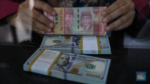 Dolar AS Bergelombang, Rupiah Bergerak Tipis di Tengah Ketegangan Global