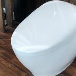 Misteri Saham Produsen Toilet Melonjak: Ada 'Otak' AI di Baliknya!